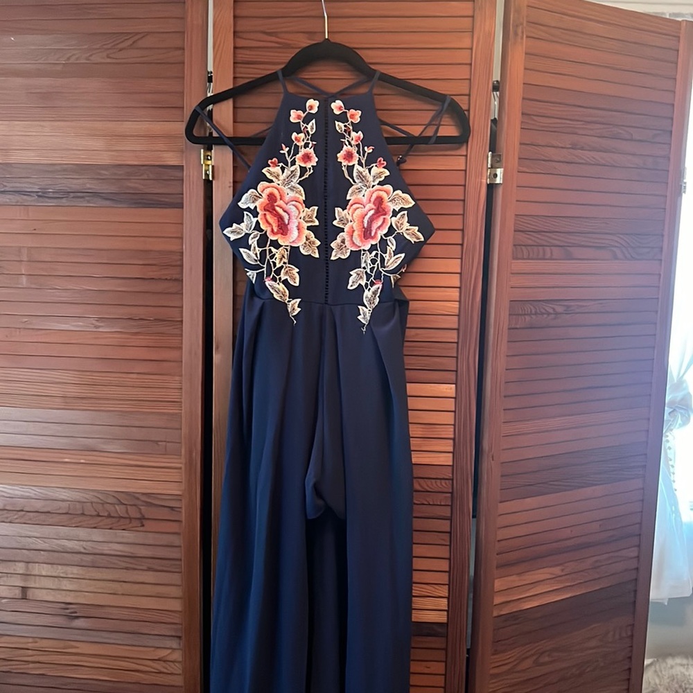 Navy embroidered floral romper with cape skirt